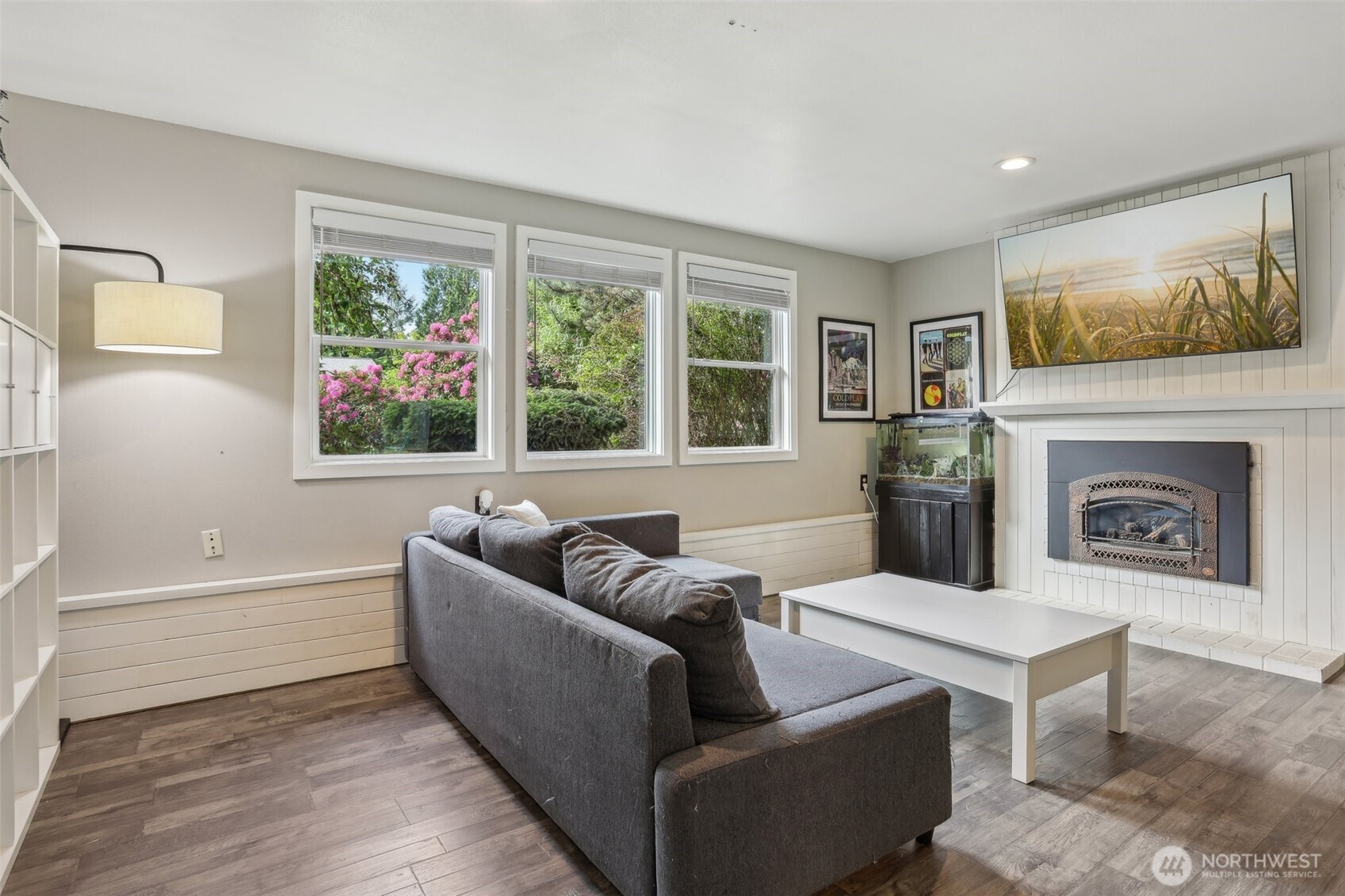 2711 164th Place Southeast Bothell, WA 98012 - Photo 18 of 26 a living room with furniture and a fireplace
