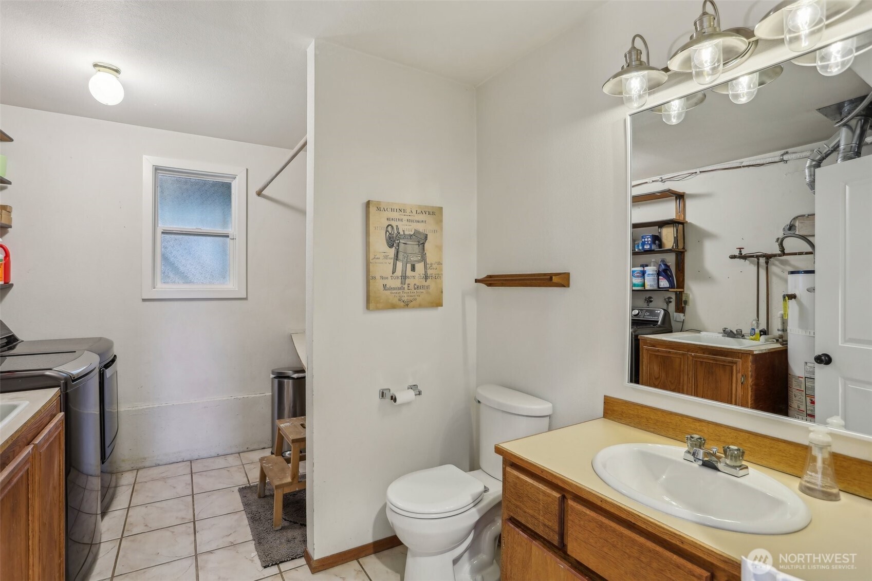 2711 164th Place Southeast Bothell, WA 98012 - Photo 21 of 26 a bathroom with a sink toilet tub and shower
