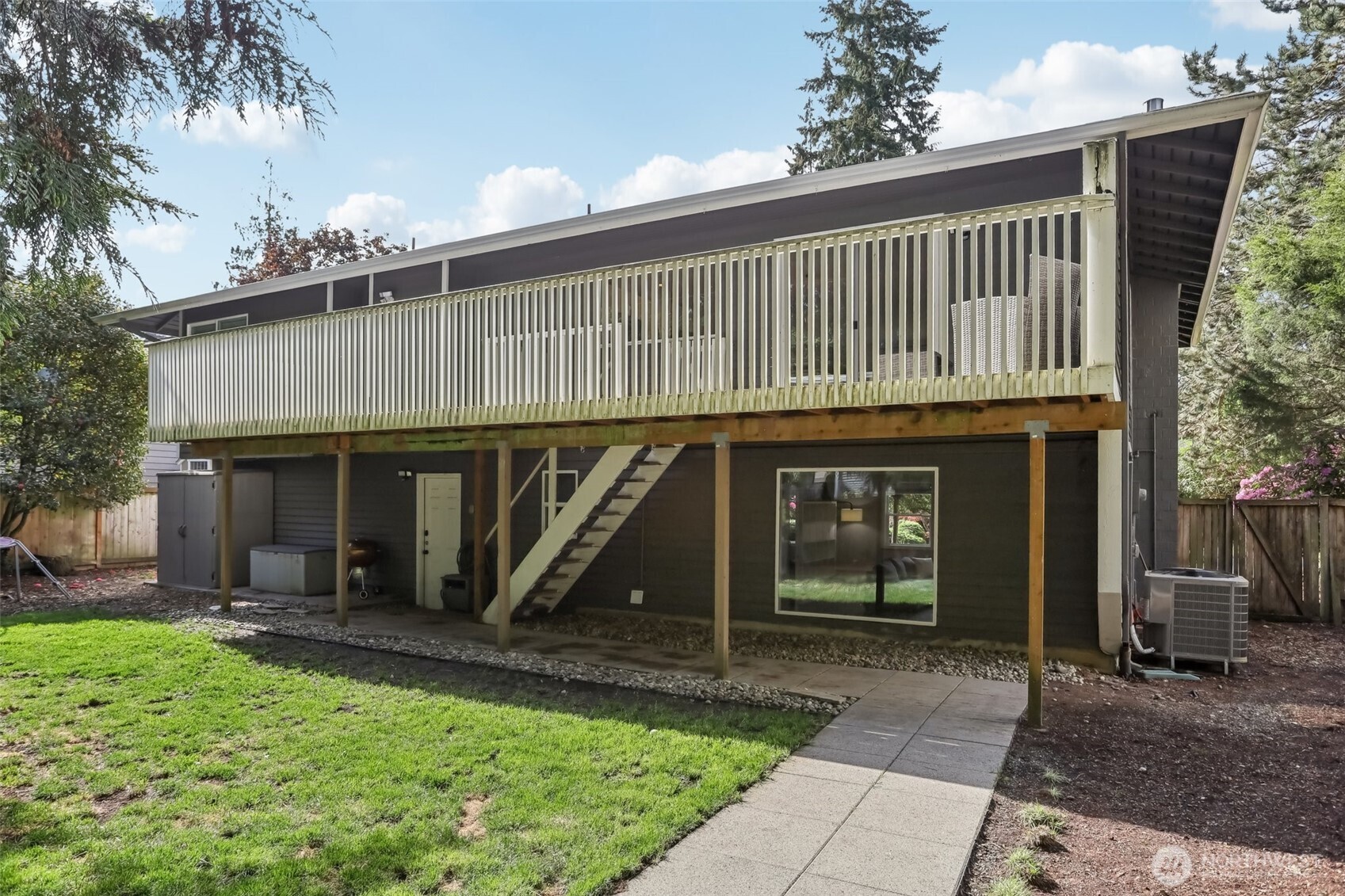 2711 164th Place Southeast Bothell, WA 98012 - Photo 22 of 26 a view of a house with backyard and porch