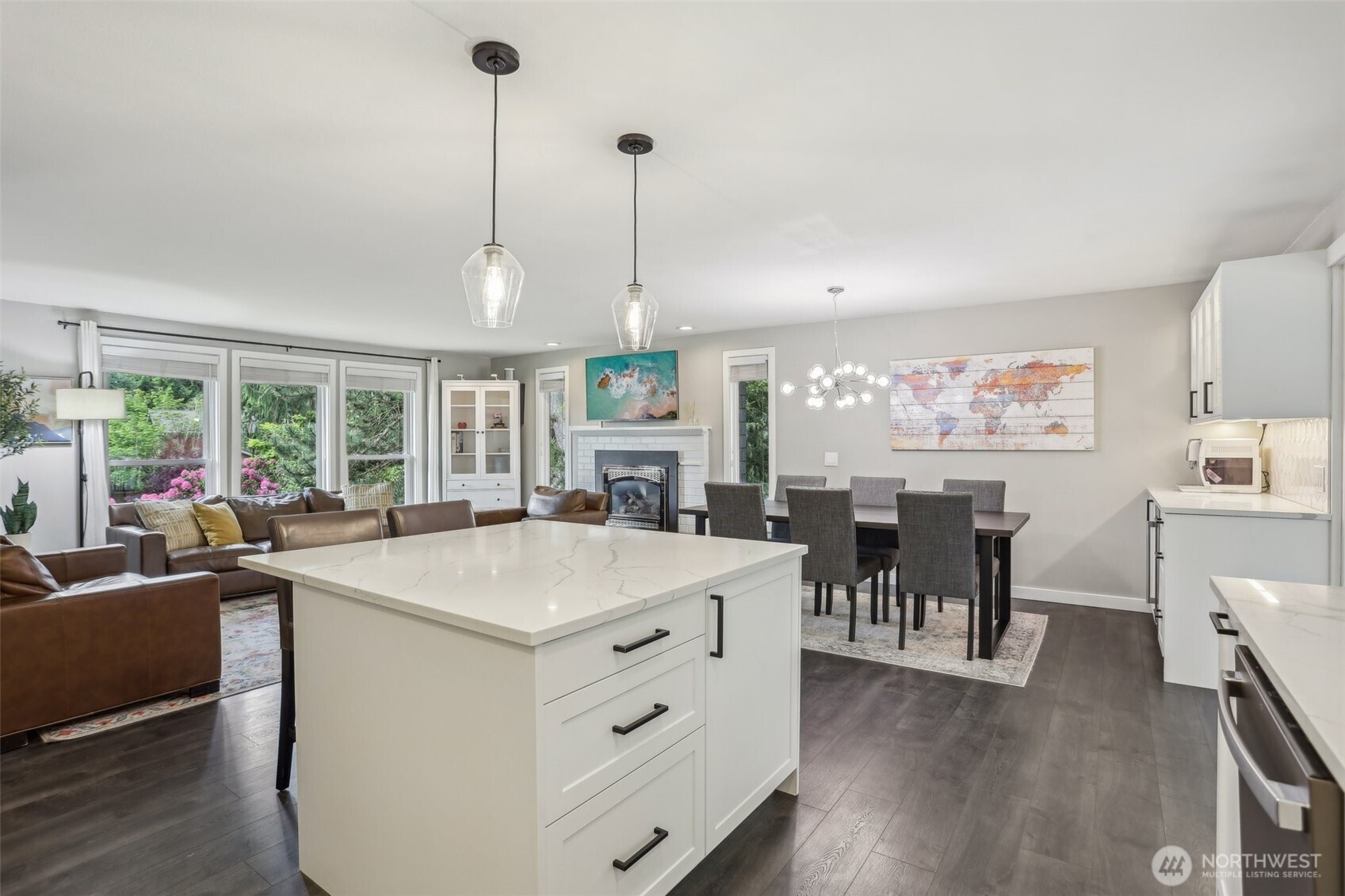 2711 164th Place Southeast Bothell, WA 98012 - Photo 10 of 26 a view of a dining table chairs and chandelier
