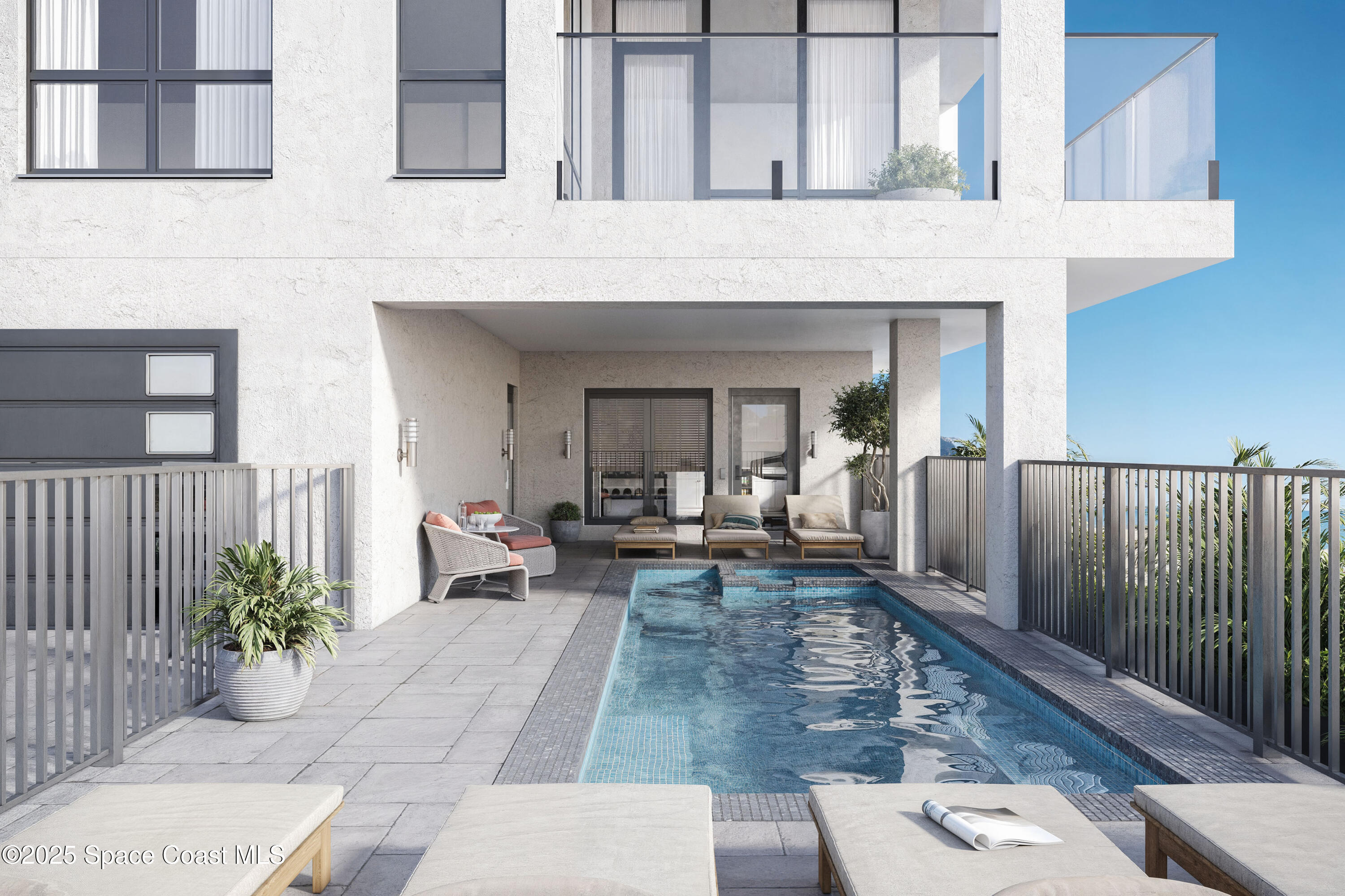 1455 N Highway, Unit 501 Indialantic, FL 32903 - Photo 13 of 27 a view of a patio with table and chairs and potted plants
