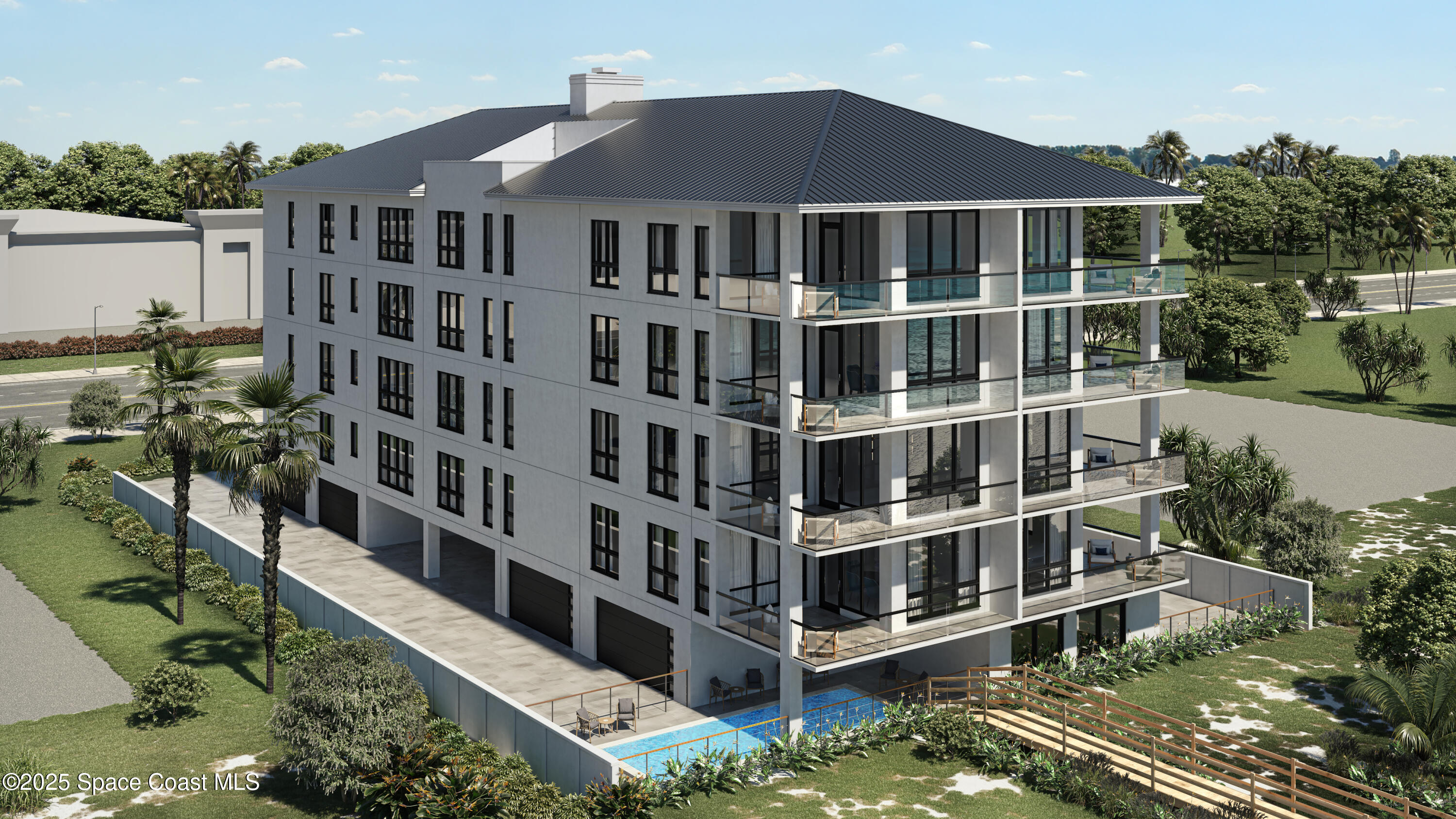 1455 N Highway, Unit 501 Indialantic, FL 32903 - Photo 16 of 27 a front view of a building with a garden