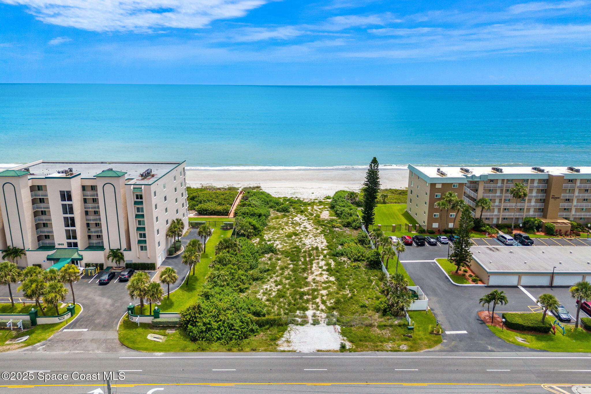 1455 N Highway, Unit 501 Indialantic, FL 32903 - Photo 18 of 27 a view of swimming pool with outdoor seating and plants
