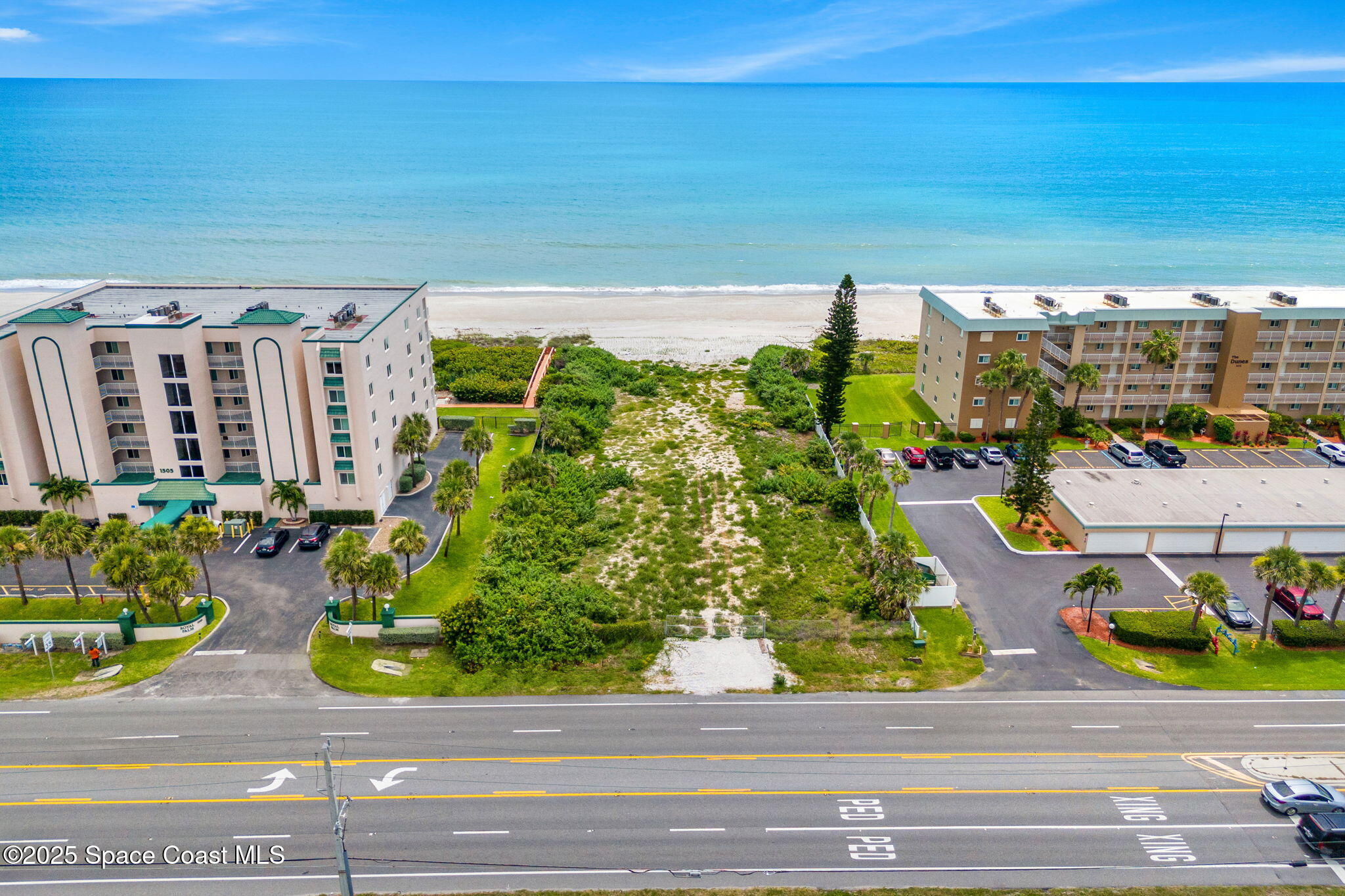 1455 N Highway, Unit 501 Indialantic, FL 32903 - Photo 21 of 27 a view of swimming pool with outdoor seating and plants