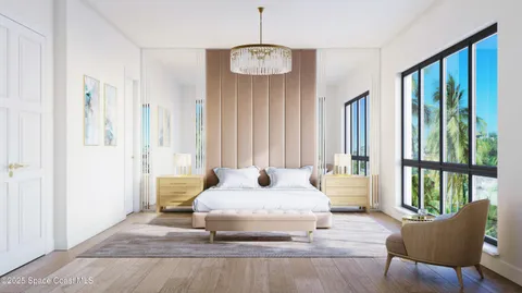 a view of a dining room with furniture and a potted plant