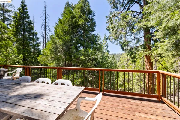 a balcony with wooden floor