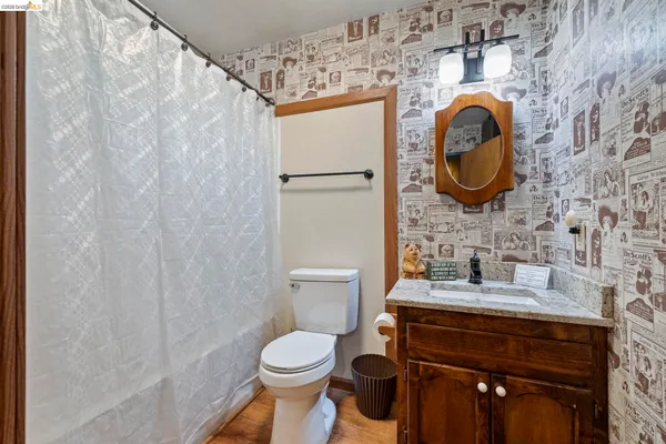 a bathroom with a toilet and a sink