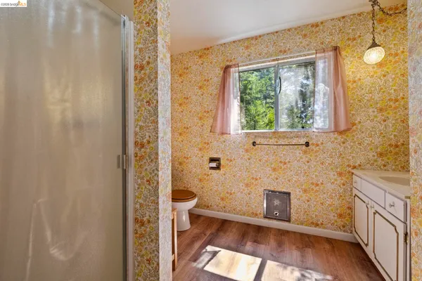 a bathroom with a sink and a shower