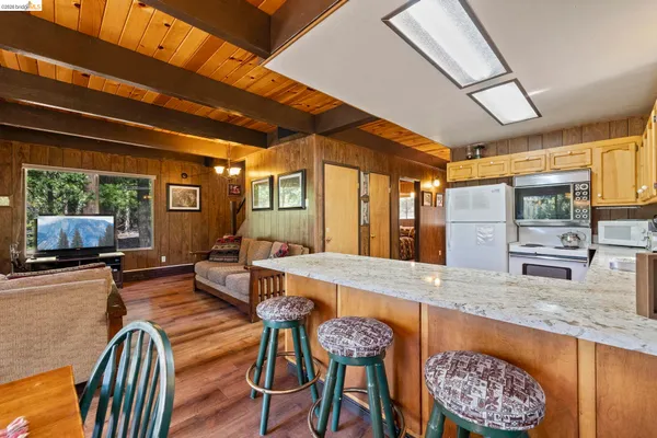 a very nice looking kitchen with a large window