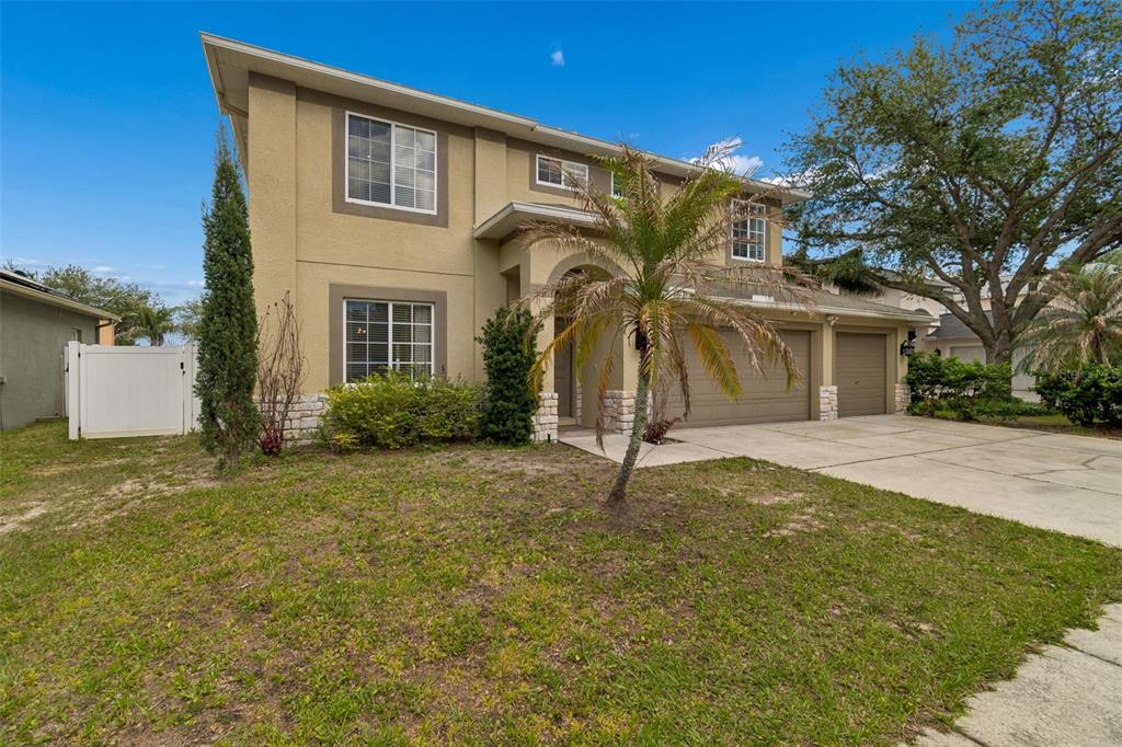 2829 Pankaw Lane Valrico, FL 33596 - Photo 4 of 55 a front view of a house with a yard
