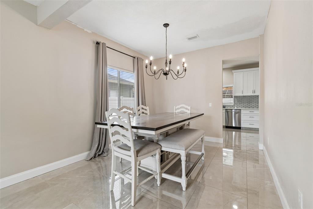 2829 Pankaw Lane Valrico, FL 33596 - Photo 8 of 55 a view of a dining room with furniture and window