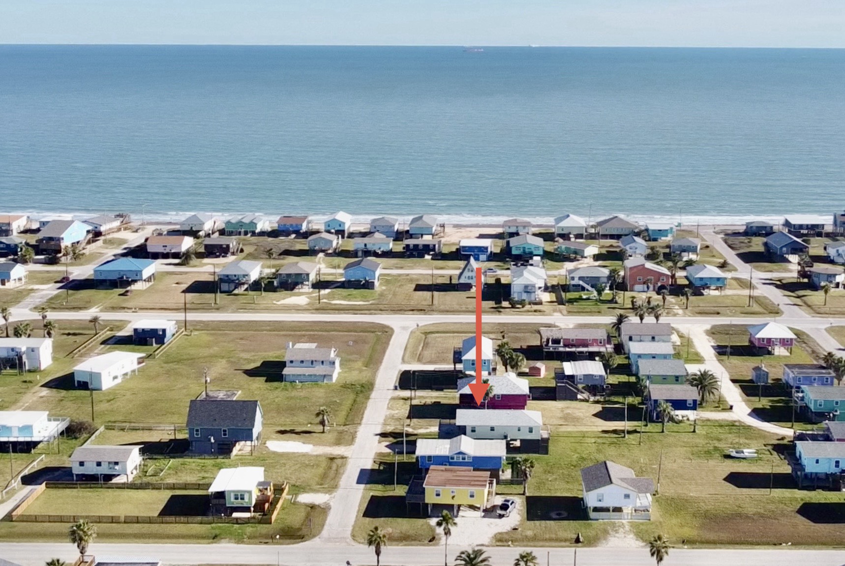 317 Olive Street Surfside Beach, TX 77541 - Photo 1 of 22 a picture of car parking