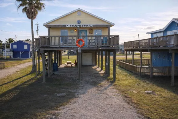 a view of a dinning room with wooden floor