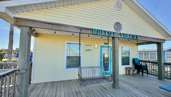 a view of a swimming pool with a patio