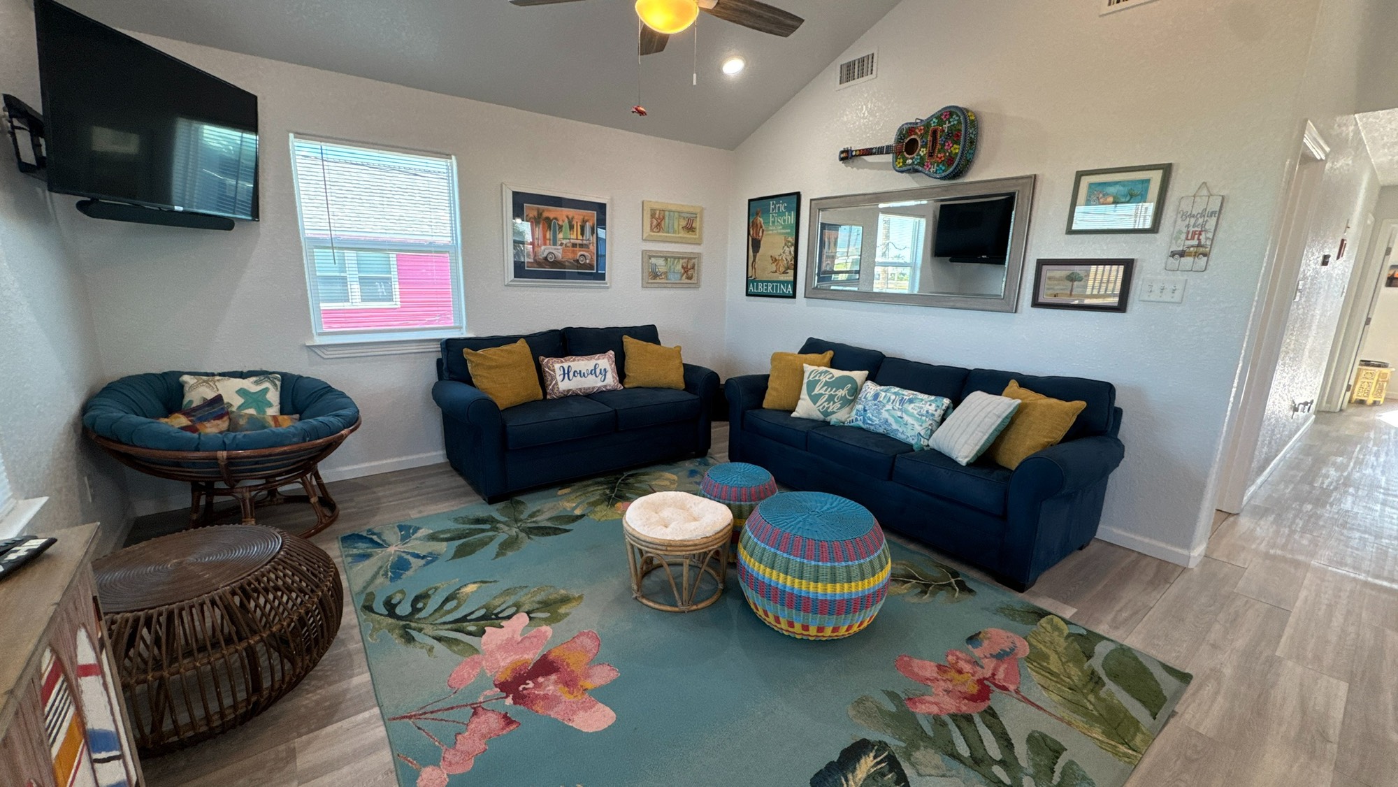 317 Olive Street Surfside Beach, TX 77541 - Photo 6 of 22 a living room with furniture and a flat screen tv