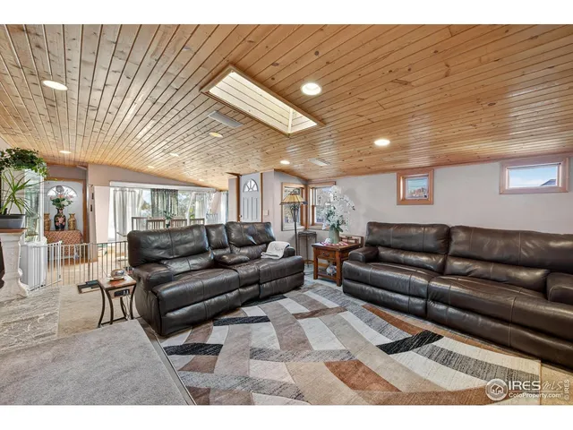 a living room with furniture and a couch