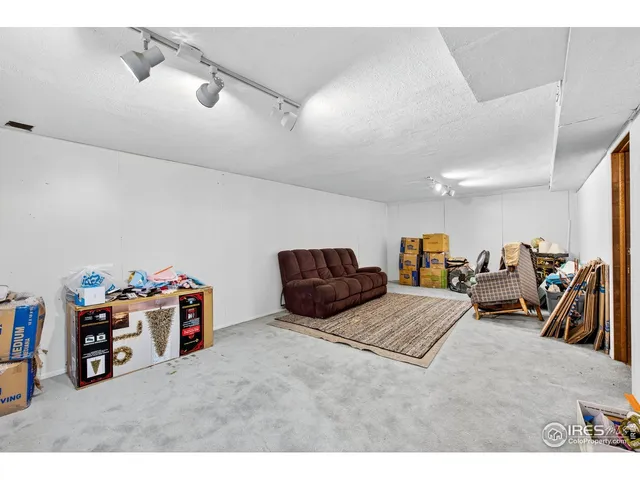 a bedroom with a bed and a walk in closet