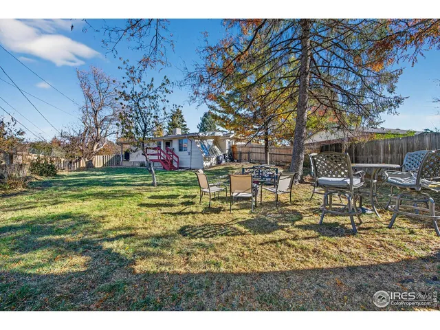 a view of swimming pool with outdoor seating