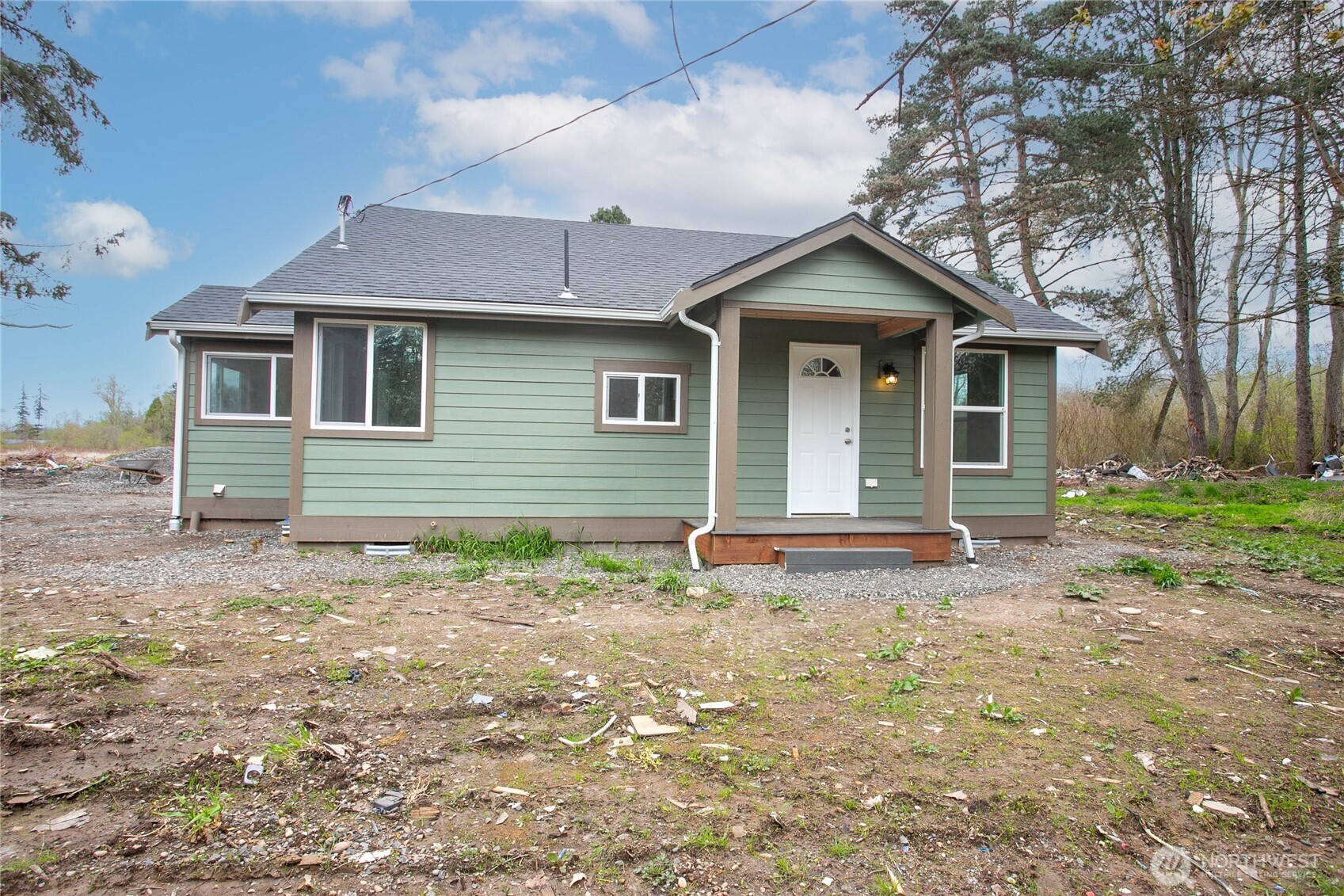 4656 Bay Road Blaine, WA 98230 - Photo 23 of 31 a house with trees in the background