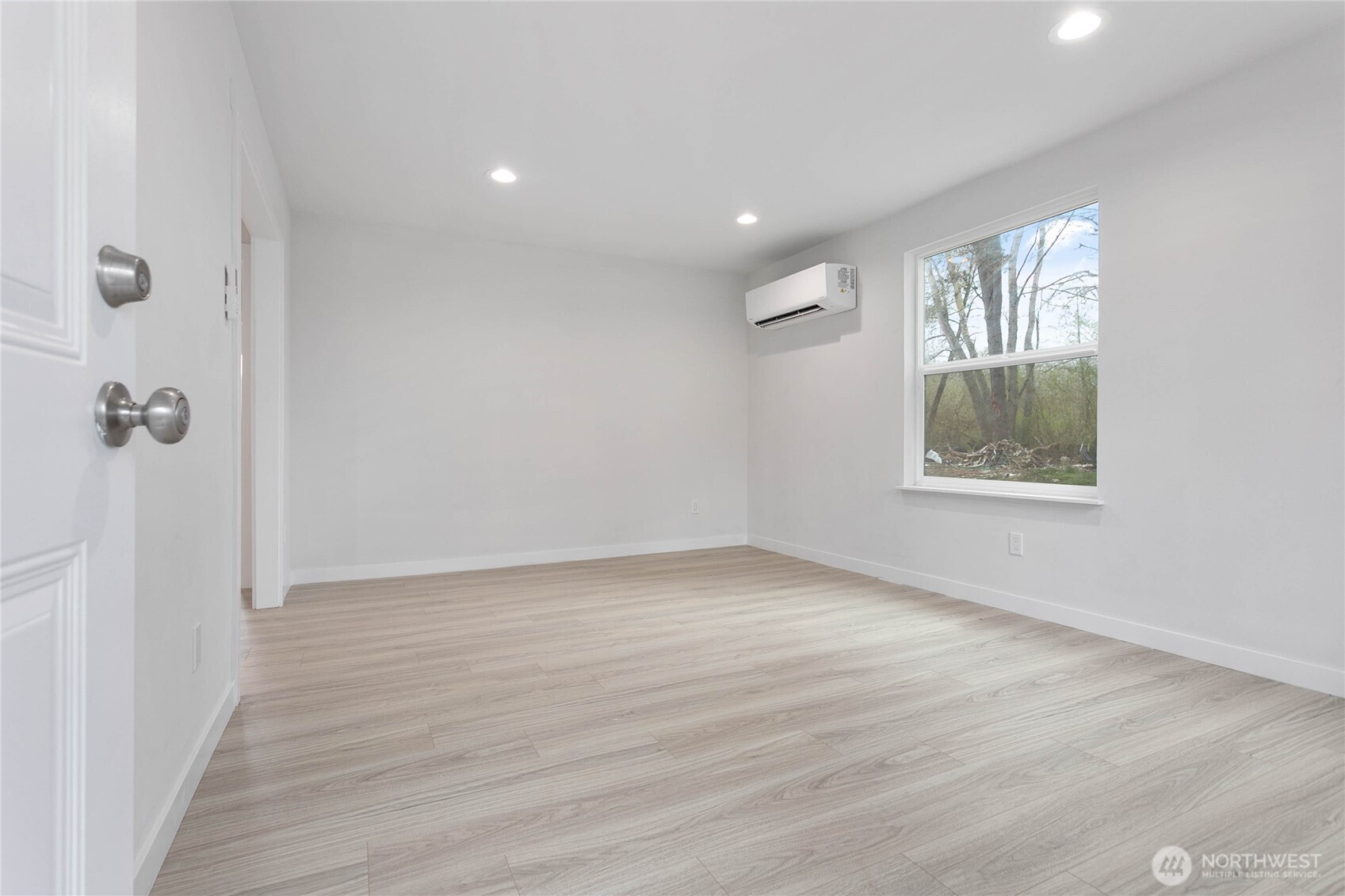 4656 Bay Road Blaine, WA 98230 - Photo 10 of 31 wooden floor in an empty room with a window