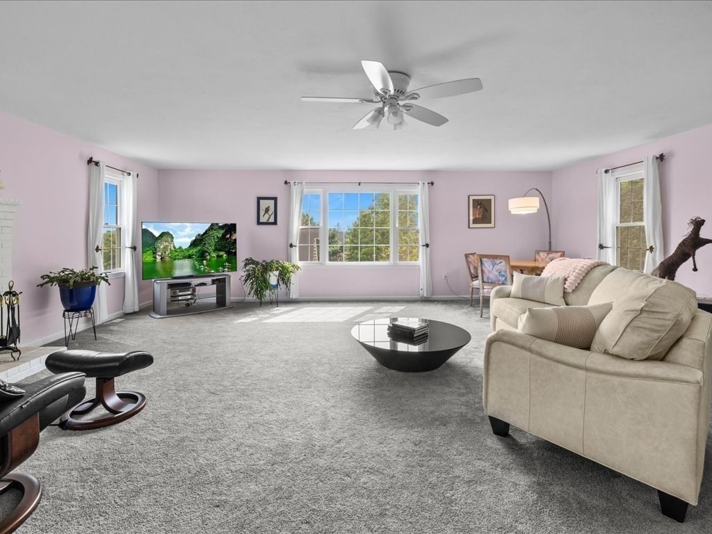 6 Wood Street Upton, MA 01568 - Photo 15 of 40 a living room with furniture and a wooden floor