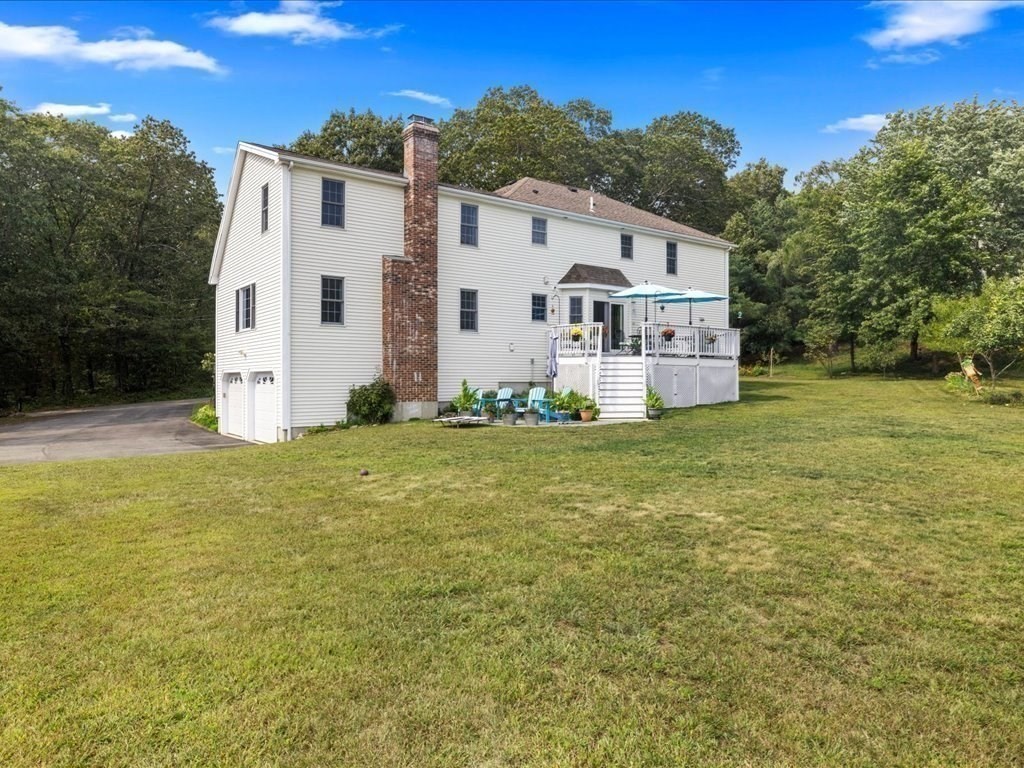 6 Wood Street Upton, MA 01568 - Photo 29 of 40 a view of a house with backyard