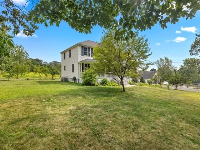 a view of a house with a big yard