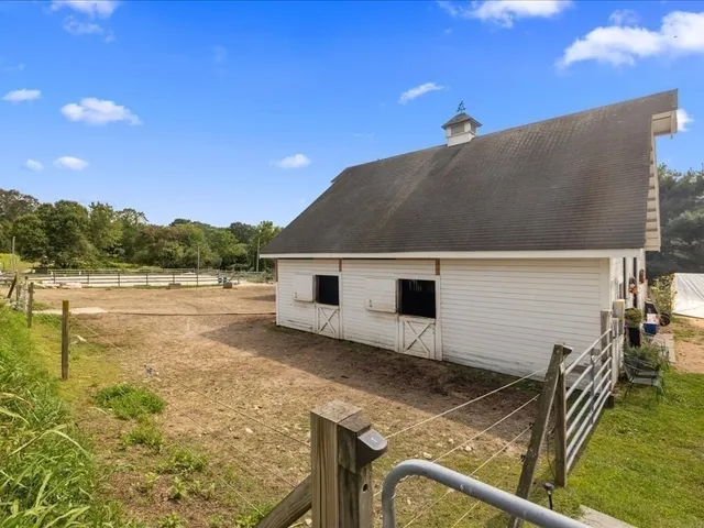 a house with river in front of it
