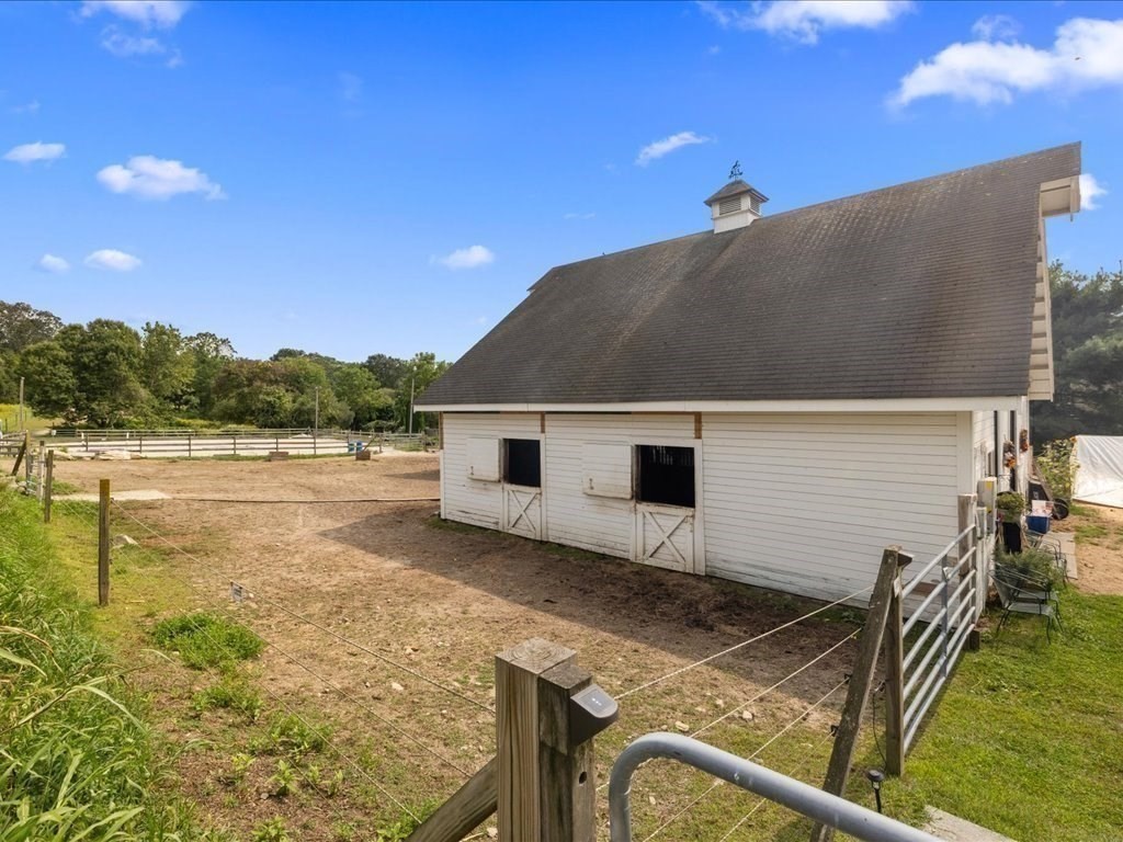 6 Wood Street Upton, MA 01568 - Photo 34 of 40 a house with river in front of it