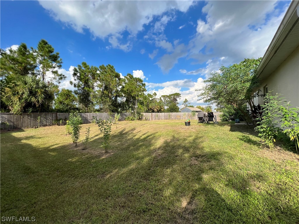 5018 Dolphin Circle LaBelle, FL 33935 - Photo 17 of 17 a view of yard with swimming pool