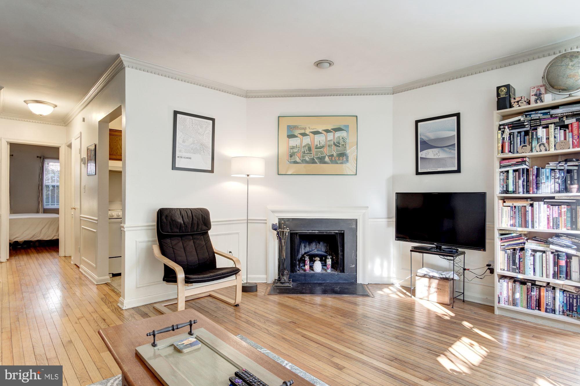 1906 17th Street Northwest Washington, DC 20009 - Photo 31 of 42 Woodburning fireplace in lower level unit