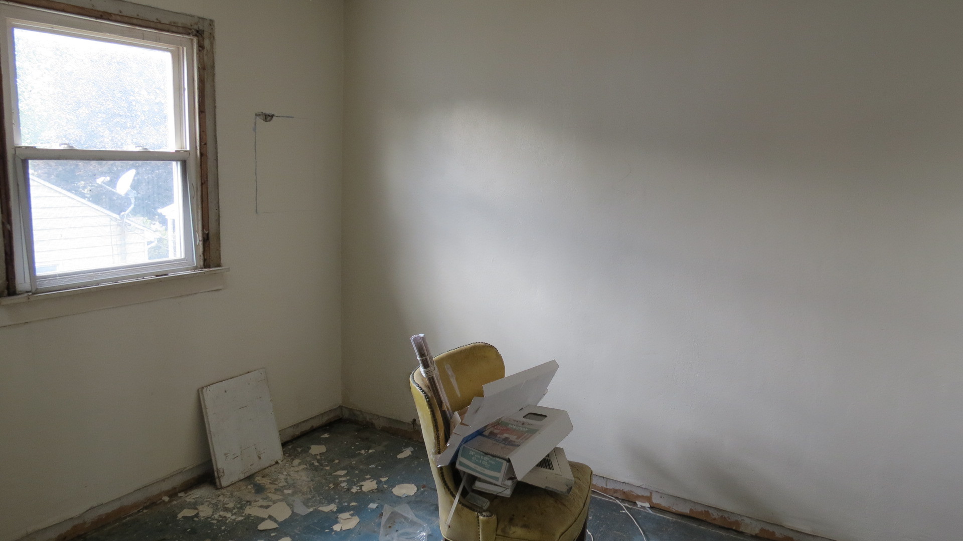 1708 North Center Street Crest Hill, IL 60403 - Photo 12 of 12 a room with a chair and a window