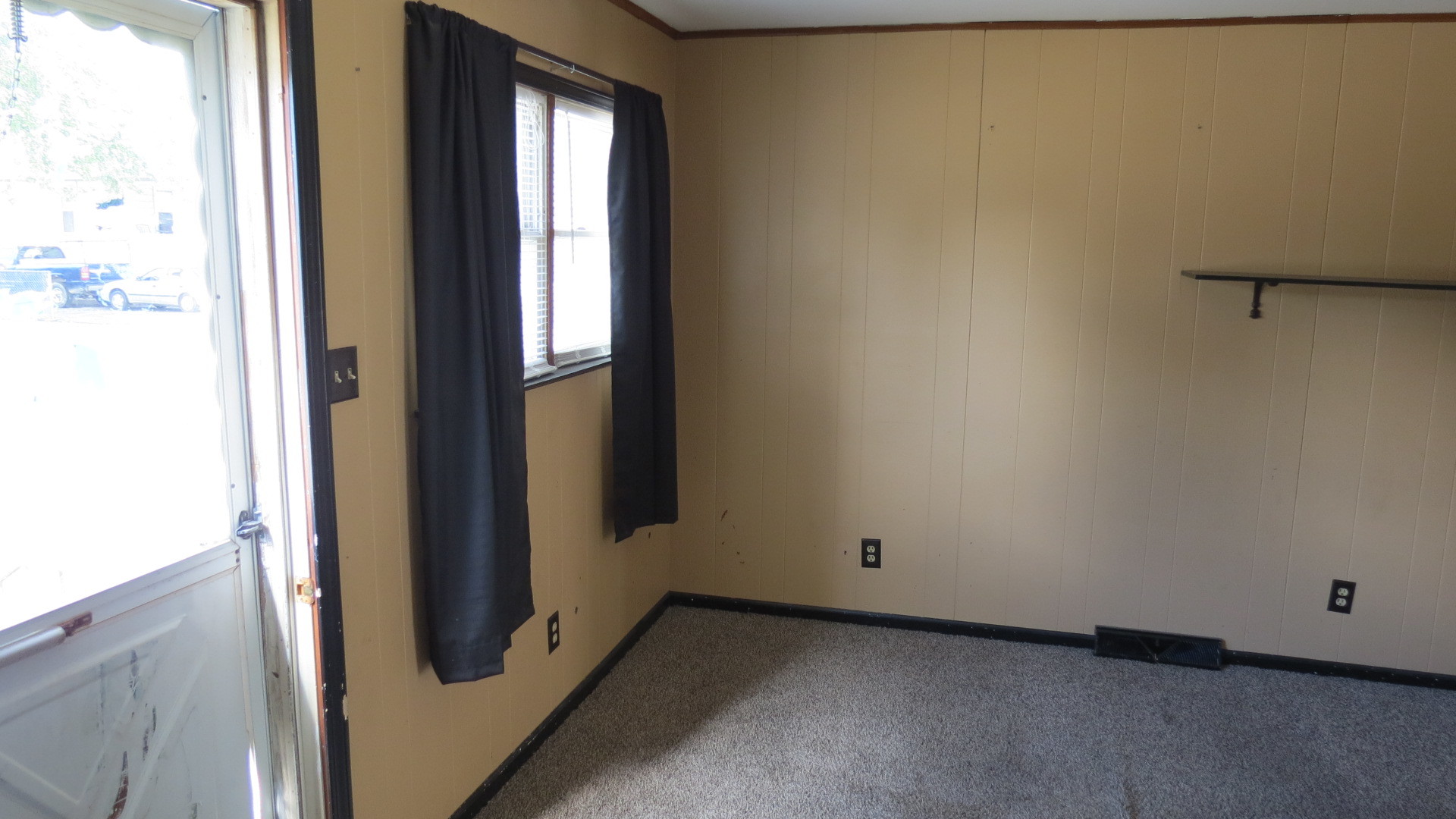 1708 North Center Street Crest Hill, IL 60403 - Photo 5 of 12 a view of an empty room and window