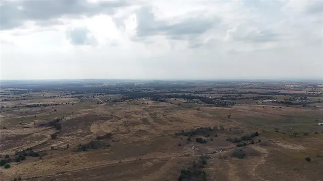 an aerial view of beach and city