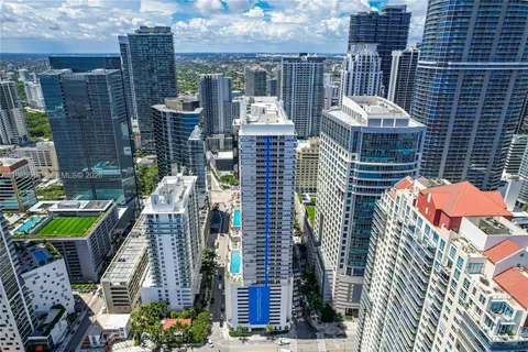 a view of a building with a street
