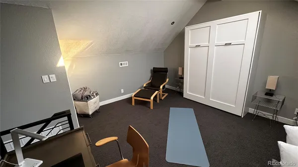 a room with furniture and a window