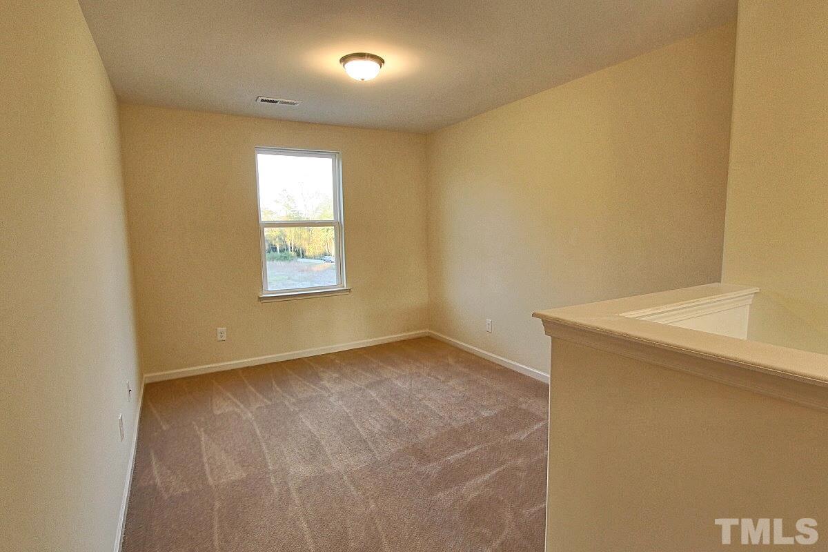 532 Gold Valley Road Spring Hope, NC 27882 - Photo 7 of 19 an empty room with a window