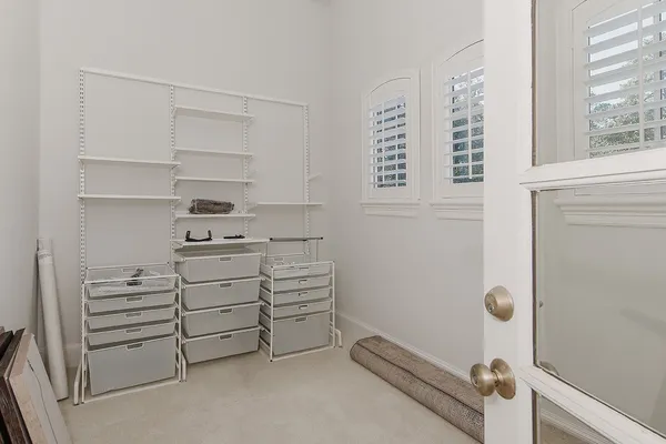 a view of a livingroom with furniture and window