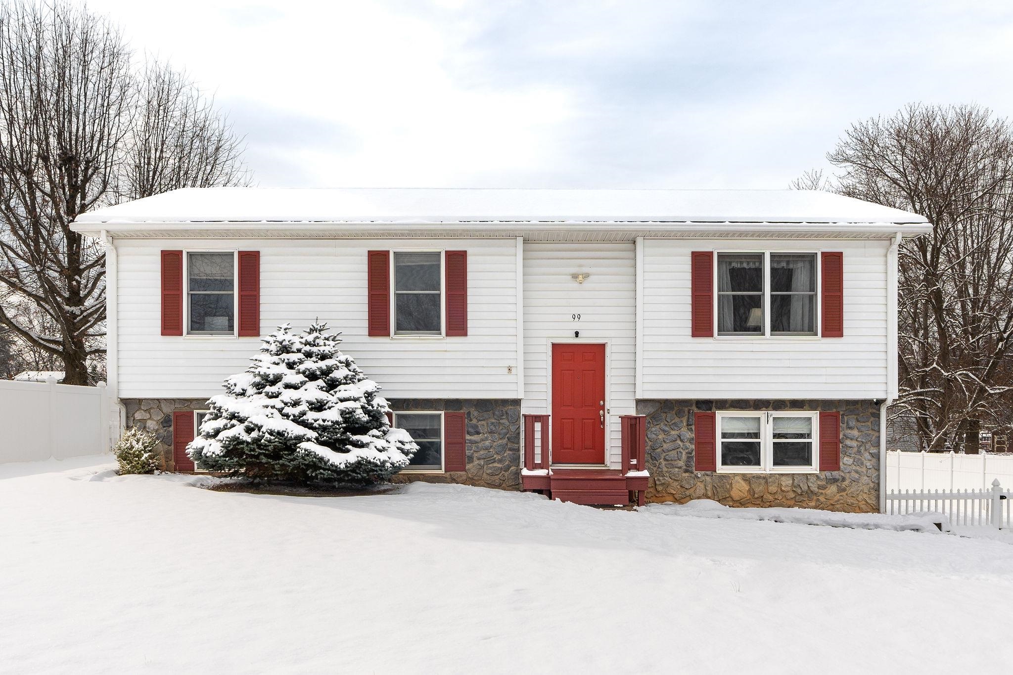99 Harvest Road Waynesboro, VA 22980 - Photo 1 of 36 a front view of a house with a yard and garage