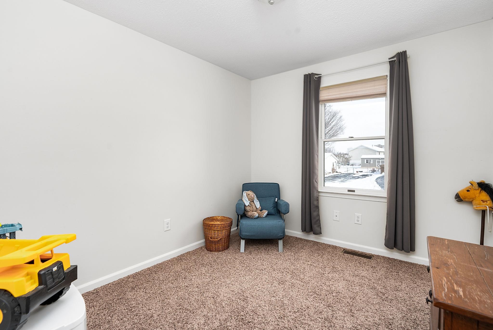 99 Harvest Road Waynesboro, VA 22980 - Photo 13 of 36 a room with a window and toys