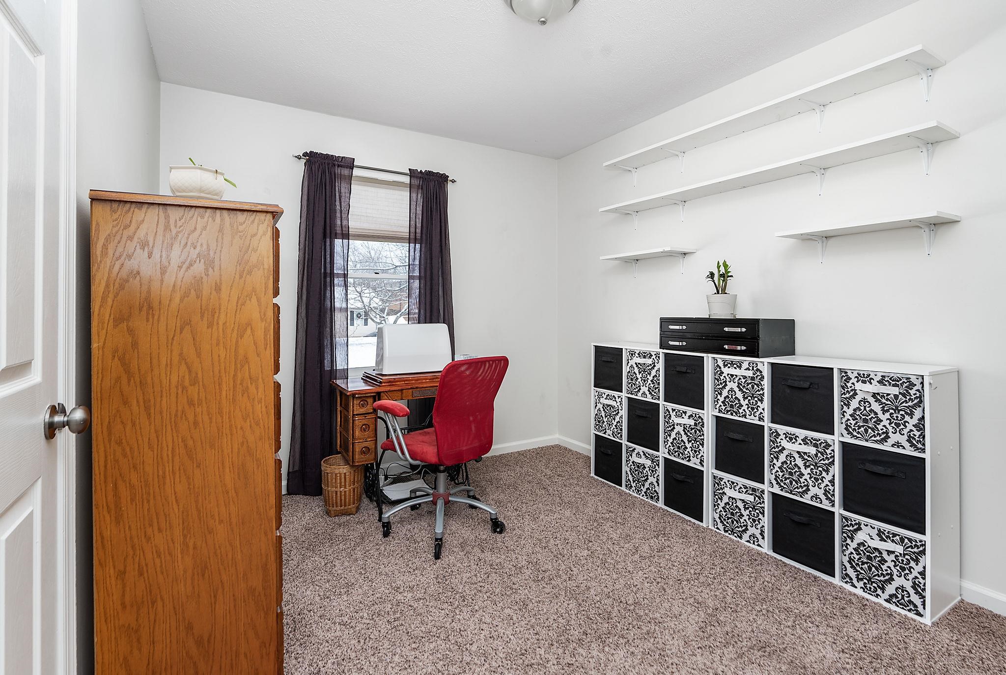 99 Harvest Road Waynesboro, VA 22980 - Photo 15 of 36 a room with furniture a rug and a window