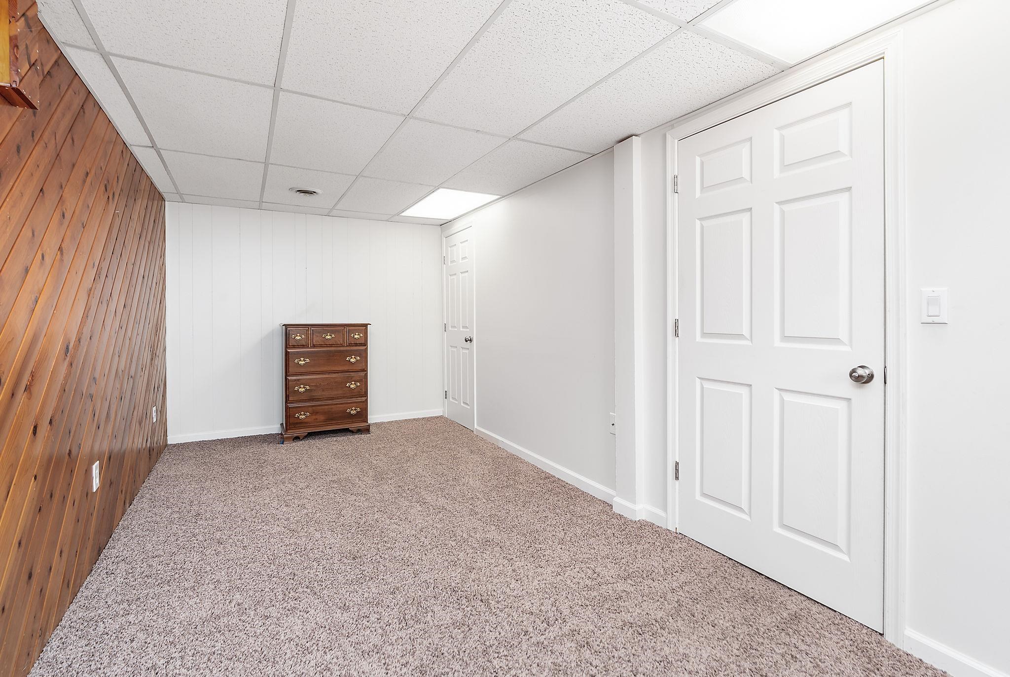 99 Harvest Road Waynesboro, VA 22980 - Photo 21 of 36 a view of an empty room with a window