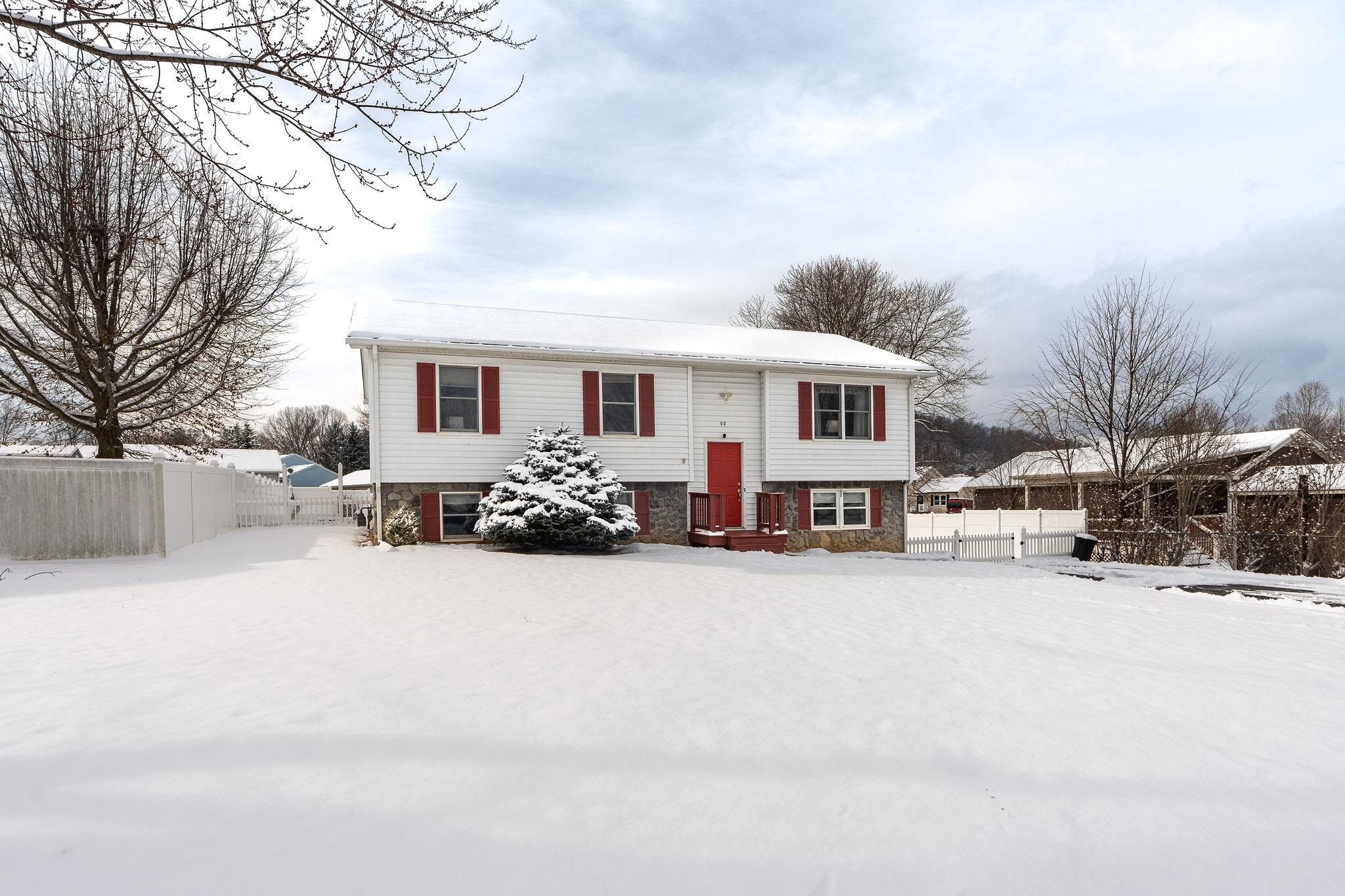 99 Harvest Road Waynesboro, VA 22980 - Photo 27 of 36 a view of a house with a snow in the yard