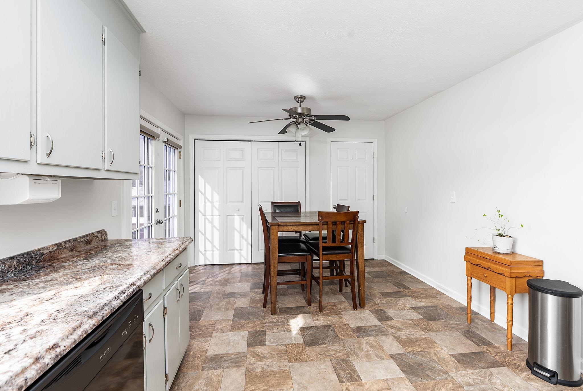 99 Harvest Road Waynesboro, VA 22980 - Photo 7 of 36 a kitchen with a table and chairs in it
