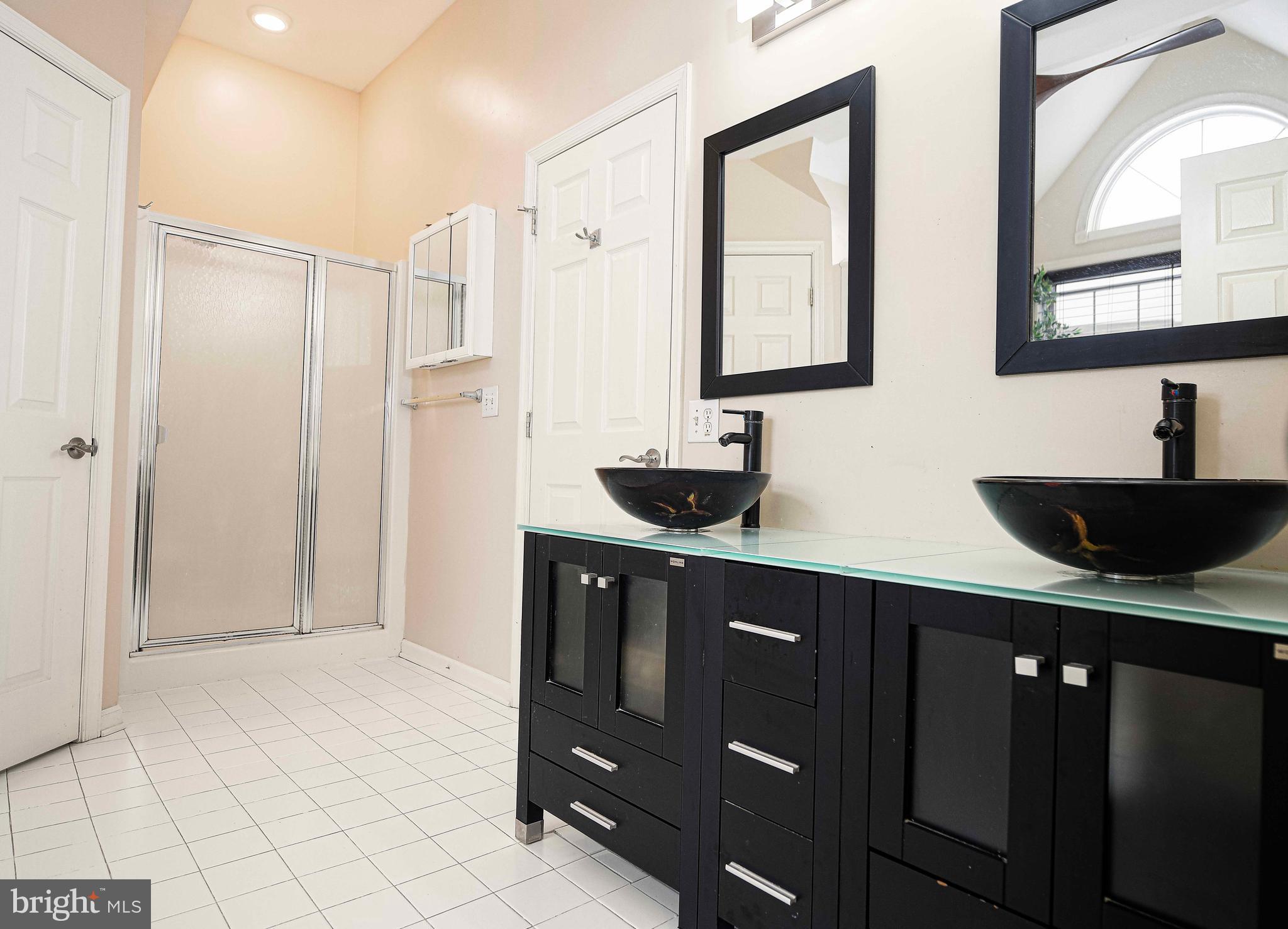 203 Pointe Way, Unit 53 Havre de Grace, MD 21078 - Photo 21 of 29 a spacious bathroom with a double vanity sink mirror and bathtub