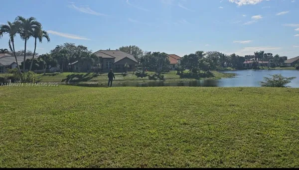 a view of a lake from a yard