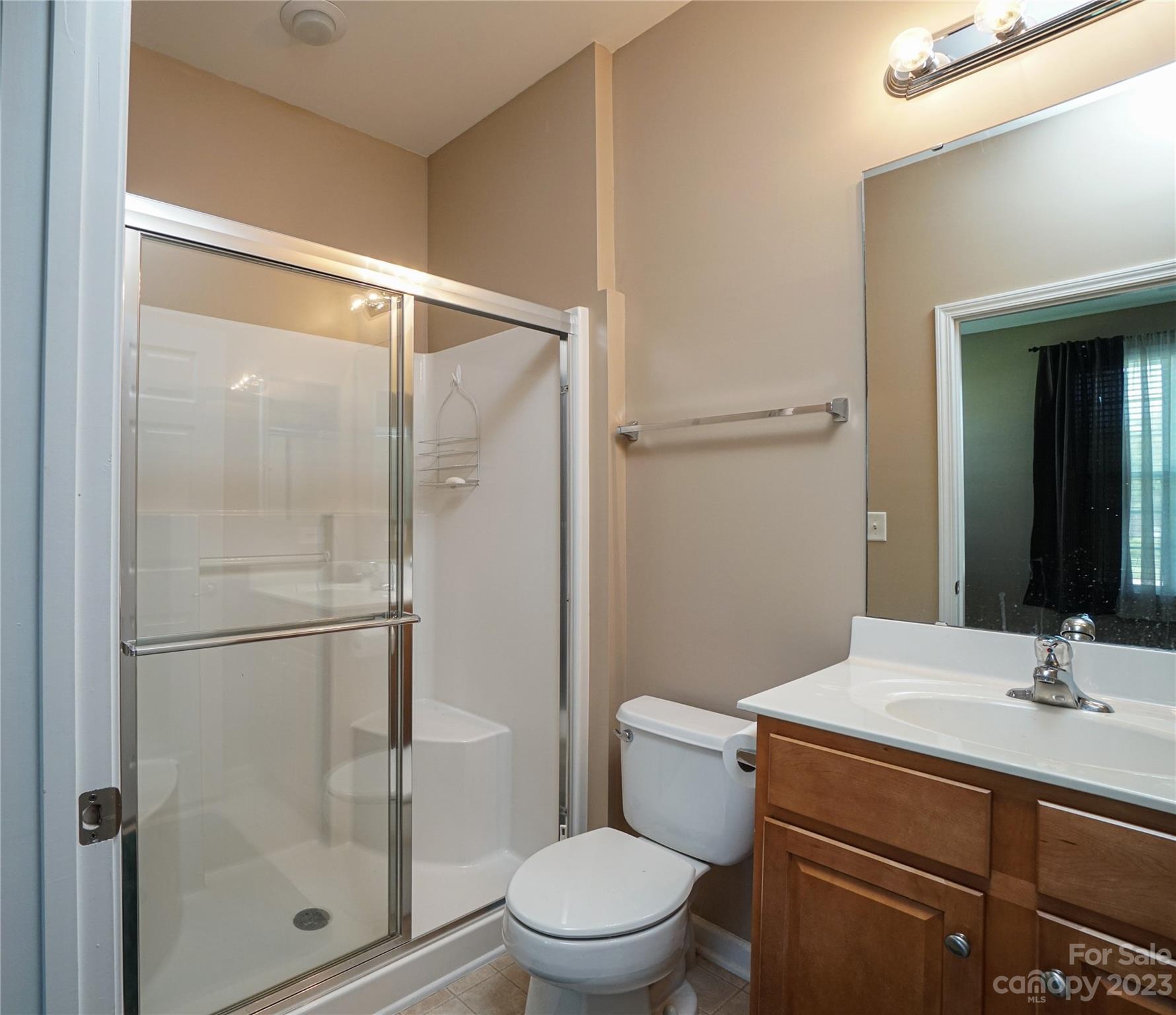 662 Amethyst Circle Fort Mill, SC 29708 - Photo 12 of 34 a bathroom with a shower a toilet and sink