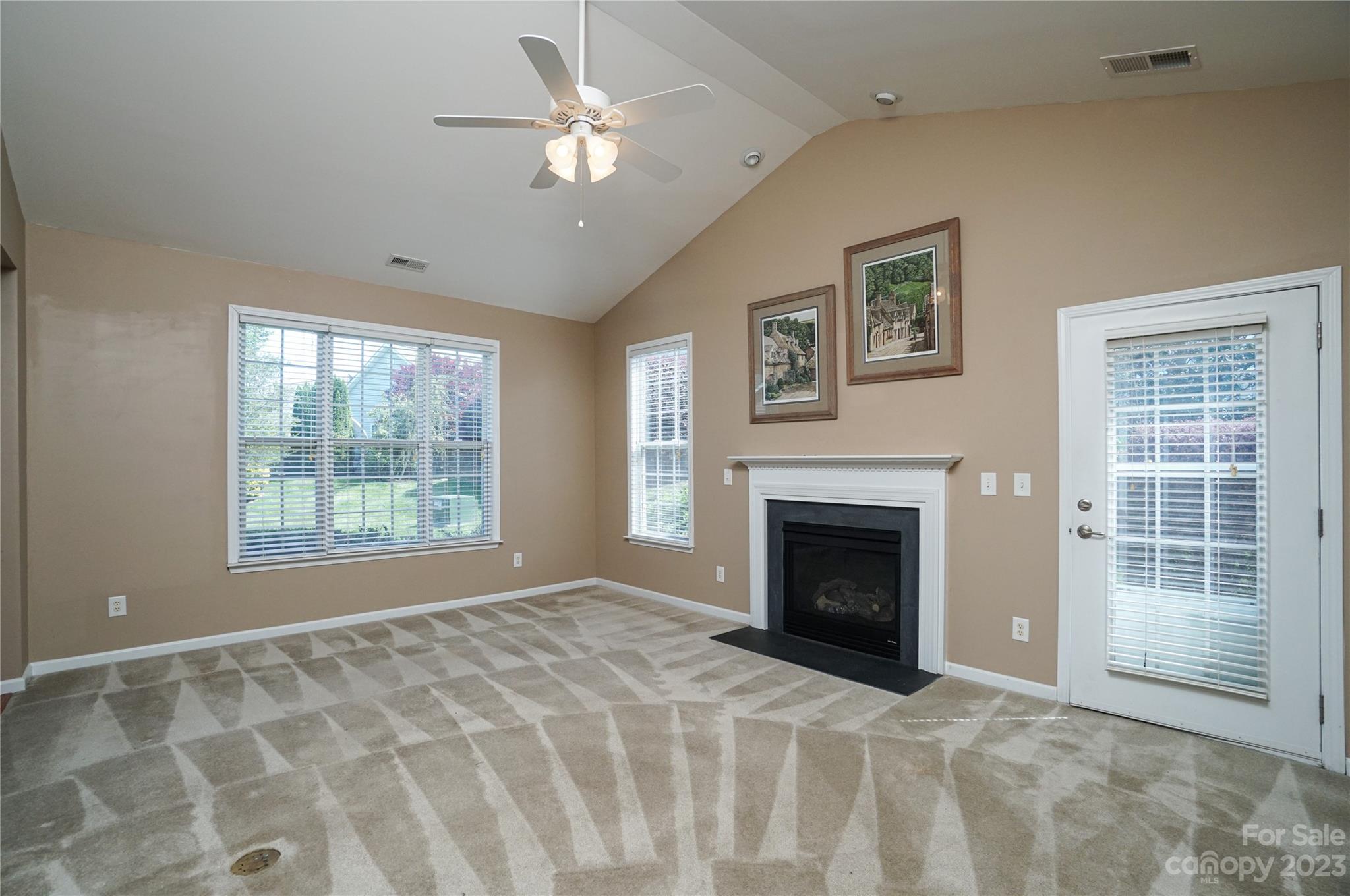 662 Amethyst Circle Fort Mill, SC 29708 - Photo 17 of 34 a view of an empty room with window and fire place
