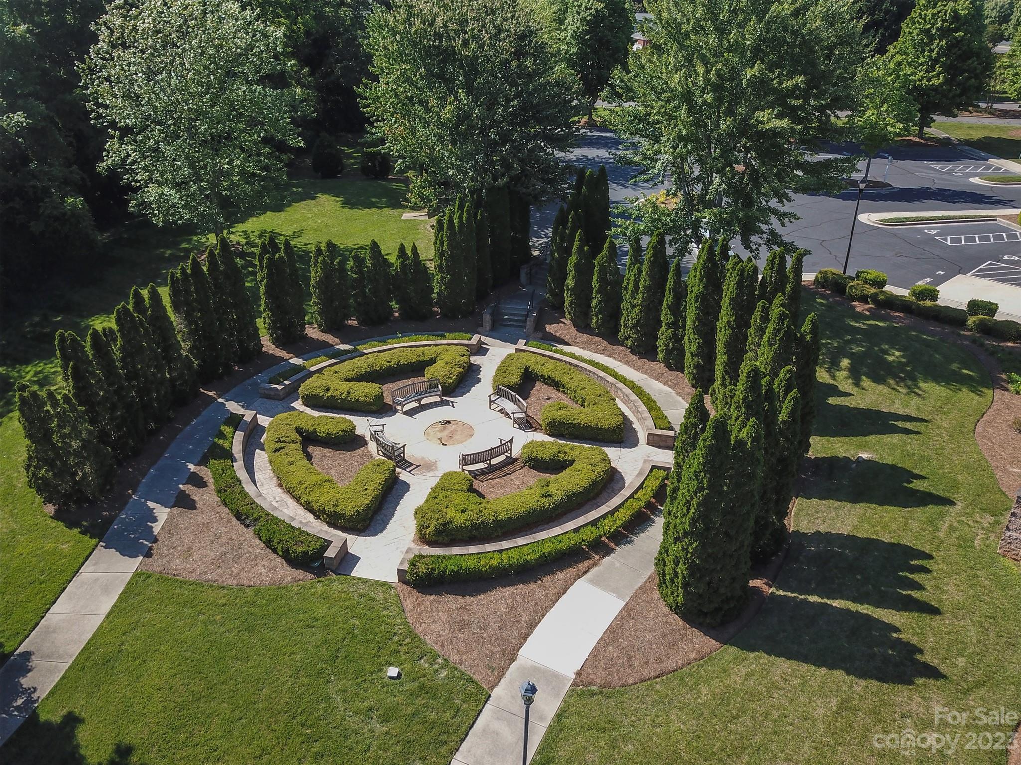 662 Amethyst Circle Fort Mill, SC 29708 - Photo 33 of 34 a patio with water fountain and outdoor seating