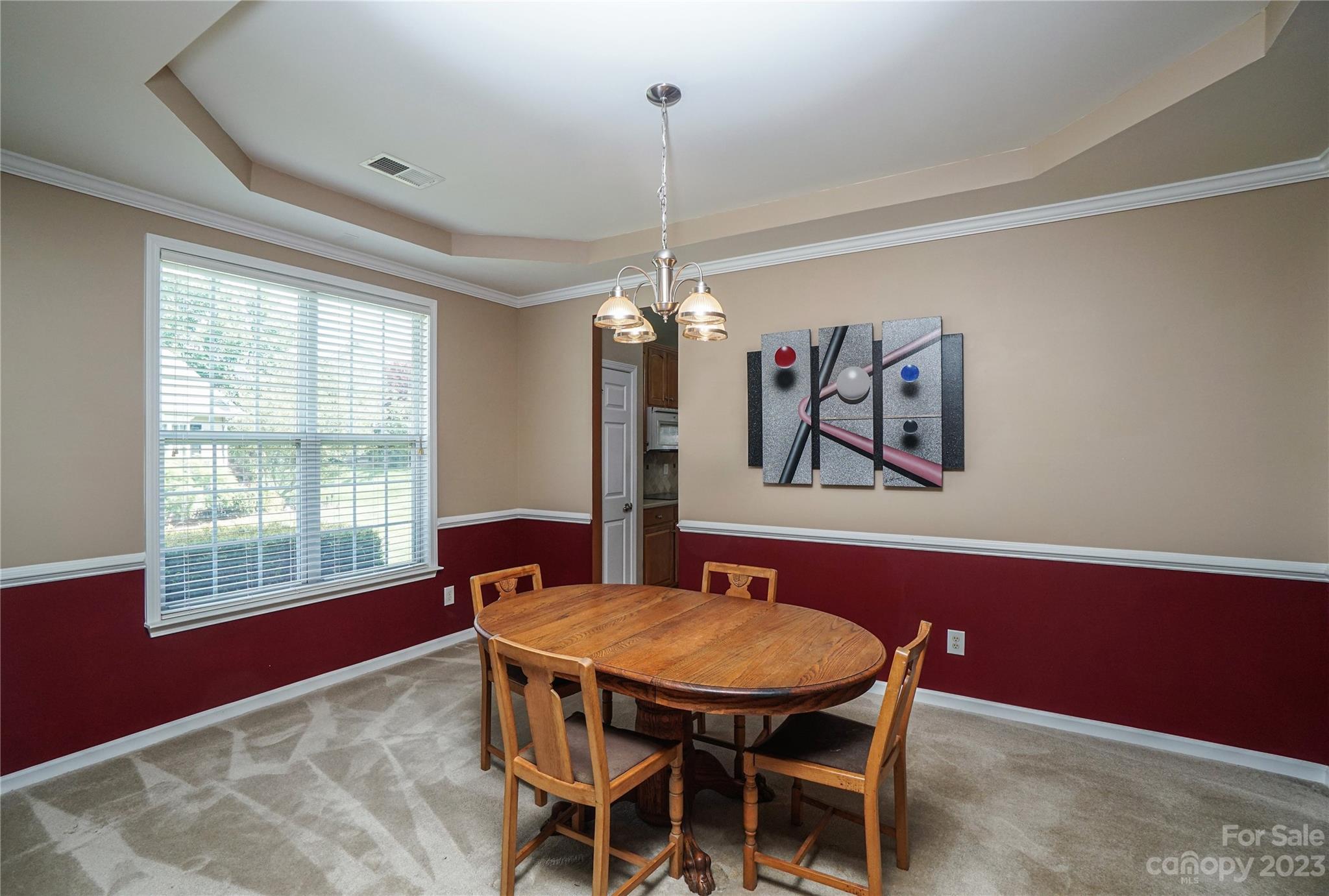 662 Amethyst Circle Fort Mill, SC 29708 - Photo 8 of 34 a dining room with furniture and window